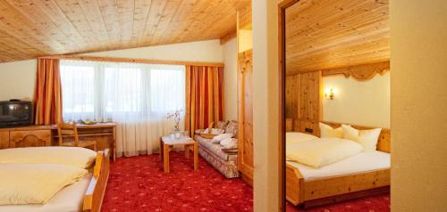 Postel nebo postele na pokoji v ubytování Hotel Hubertushof - Ihr Hotel mit Herz