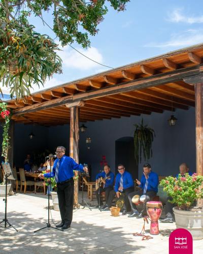 a man standing in front of a group of people at Casa Hacienda San Jose in Chincha Alta
