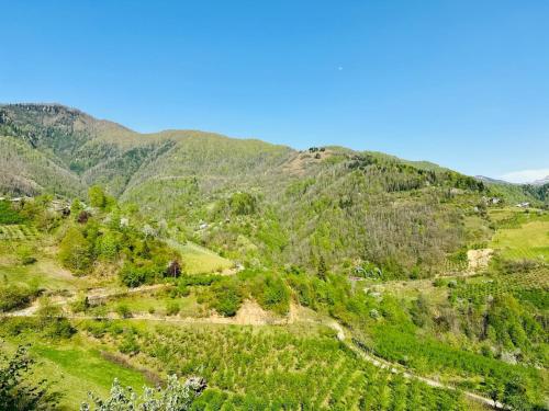a view of a mountain with a road at Eco cottage sunrise merisi in Merisi