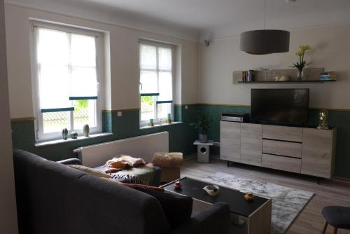Ruang duduk di Juli's Ferienhaus im Spreewald