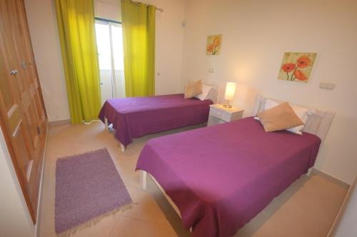 Ένα ή περισσότερα κρεβάτια σε δωμάτιο στο Villa Luna
