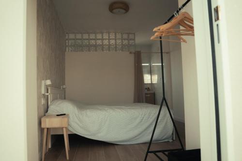 Ένα ή περισσότερα κρεβάτια σε δωμάτιο στο La Siesta Hostel
