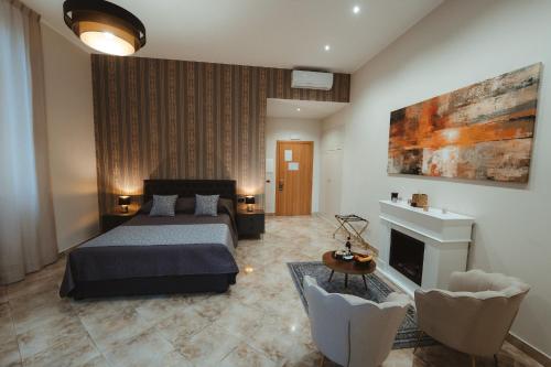 Una cama o camas en una habitación de Lifestyle and Suites