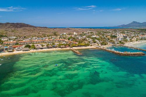 an aerial view of a beach and a city at Casa Petosa - El Anclote in Punta Mita