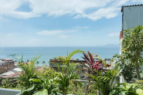 a view of the ocean from a building at Casa Nawalli Puerto Vallarta Boutique Hotel - Adults Only in Puerto Vallarta