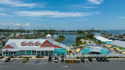 an aerial view of a resort with a parking lot at Sun Outdoors Rehoboth Bay in Millsboro
