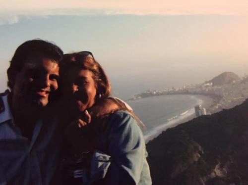 a man and a woman standing on top of a mountain at BeM Ipanema in Rio de Janeiro