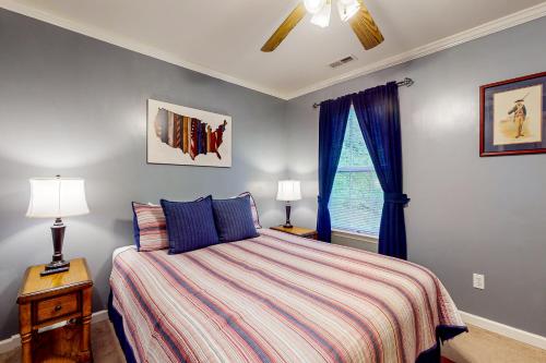 Ένα ή περισσότερα κρεβάτια σε δωμάτιο στο Baskins Creek Hideaway