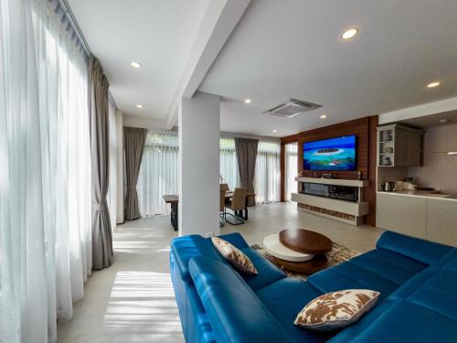 Μια τηλεόραση ή/και κέντρο ψυχαγωγίας στο Q Kata Residence