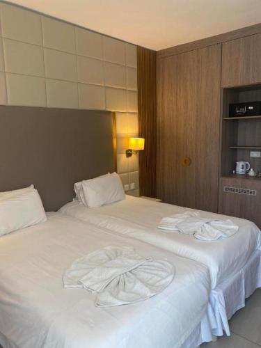 Postel nebo postele na pokoji v ubytování Tsokkos Protaras Beach Hotel