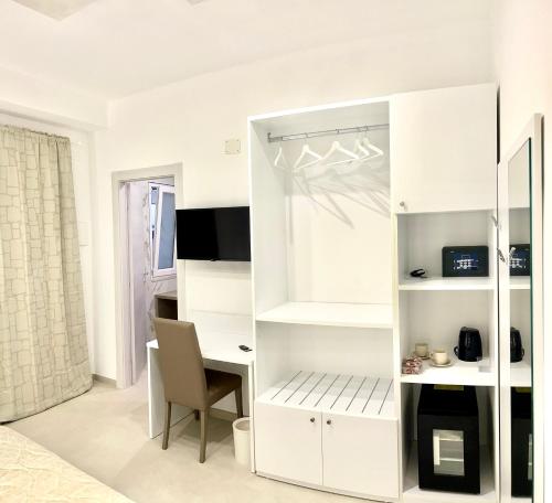 Postel nebo postele na pokoji v ubytování Gemini Luxury Rooms