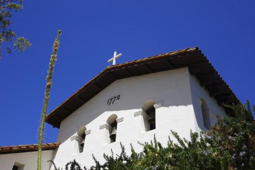 a church with a cross on top of it at Inn at San Luis Obispo in San Luis Obispo
