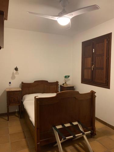 Ένα ή περισσότερα κρεβάτια σε δωμάτιο στο Villa Fructus