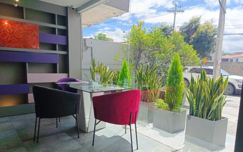 Jardín al aire libre en Rioné Hotel Boutique