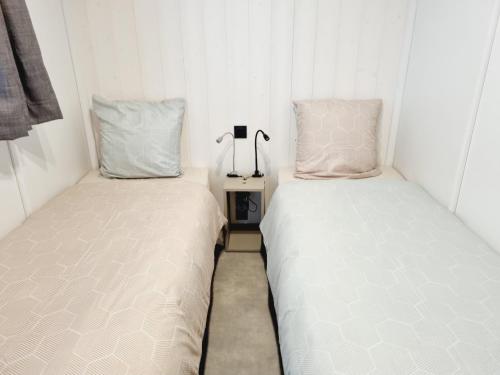 Katil atau katil-katil dalam bilik di Chalet Etxean, de 1 à 6 personnes avec Barbecue, Parking et Piscine