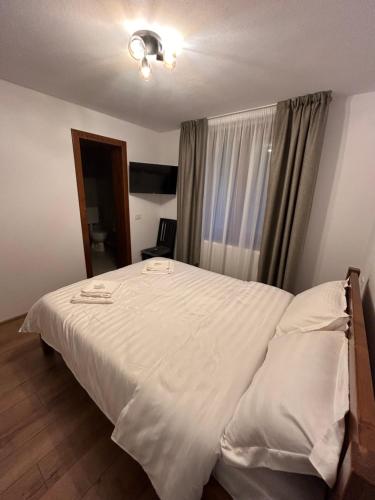 Postel nebo postele na pokoji v ubytování CABANA VALEA POPII