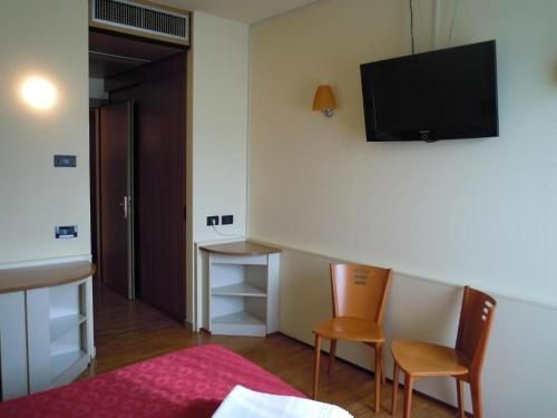 TV a/nebo společenská místnost v ubytování Hotel Xibana