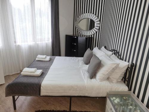 Katil atau katil-katil dalam bilik di Apartament BEACH VIBES Nessebar