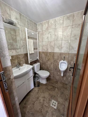 Koupelna v ubytování CABANA VALEA POPII