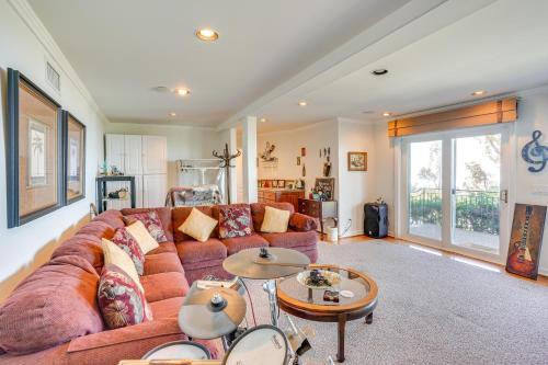 a living room with a couch and tables at Belle View Laguna Beach Getaway with Patio in Laguna Beach