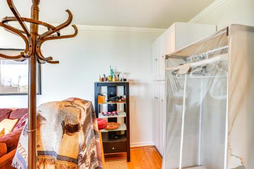 a living room with a refrigerator and a chair at Belle View Laguna Beach Getaway with Patio in Laguna Beach
