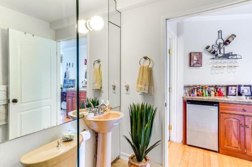 a bathroom with a sink and a mirror at Belle View Laguna Beach Getaway with Patio in Laguna Beach