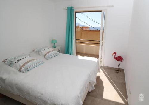 Кровать или кровати в номере La Maison de B