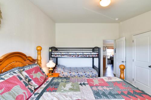 a bedroom with a large bed with a wooden headboard at Tranquil Cabin Getaway w/ Panoramic Mtn View! in Antero Junction