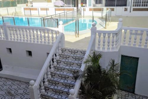 Πισίνα στο ή κοντά στο Tranquilo apartamento en San Agustin 1 dormitorio cama doble y salon con sofas camas