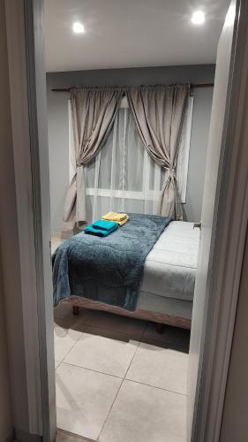 Ένα ή περισσότερα κρεβάτια σε δωμάτιο στο Upsala