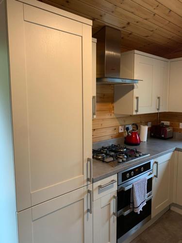 Kuchyň nebo kuchyňský kout v ubytování Corrie Lodge, Glendevon