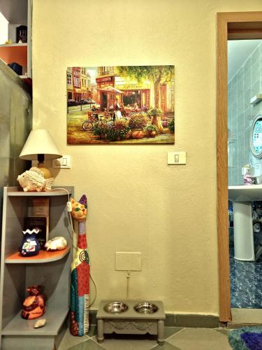 a room with a painting on the wall at SUNTAN Lovely Apartment in Golem