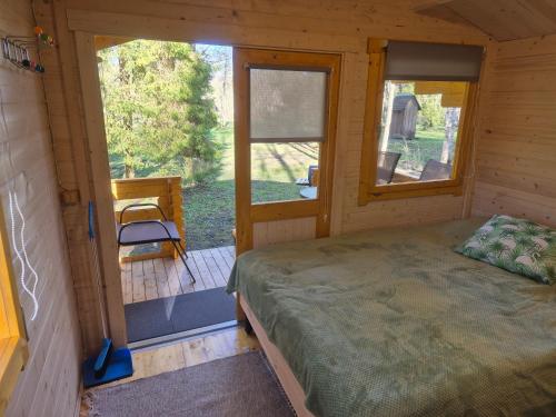Postelja oz. postelje v sobi nastanitve Lonni camping in nature