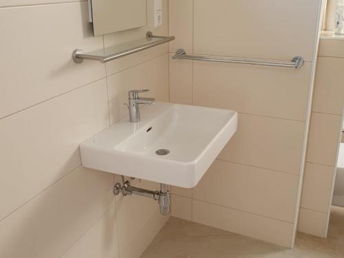 Koupelna v ubytování Seeappartements Excelsior