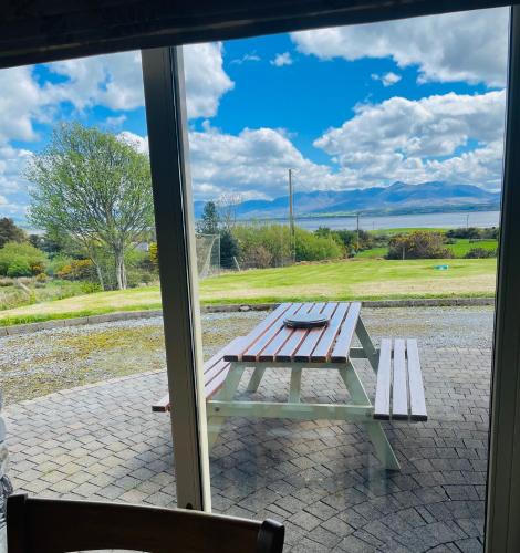 a picnic table sitting outside of a window at Conree Lodge in Castlemaine