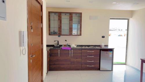 a kitchen with a sink and a counter top at Amazing Rooftop for rent in Irbid in Irbid