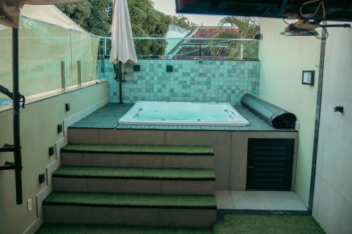 Φωτογραφία από το άλμπουμ του Casa central ampla e moderna c/ Jacuzzi σε Montes Claros