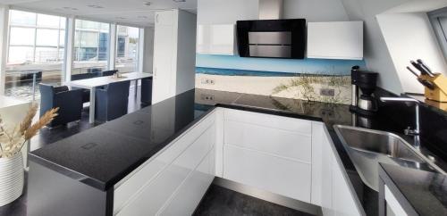 Η κουζίνα ή μικρή κουζίνα στο Ferienhaus Water Grundbelegung 4 Pers