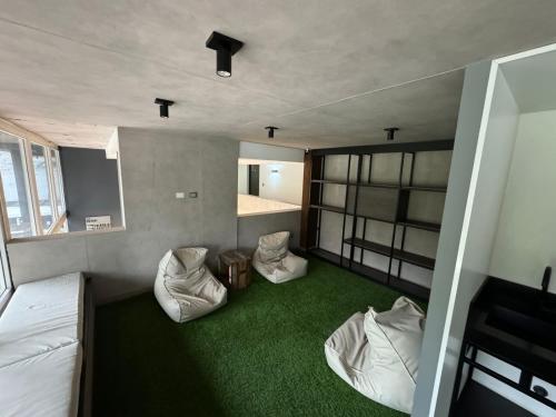 เตียงในห้องที่ Departamento Estudio Santiago