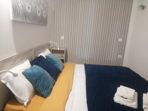 Tempat tidur dalam kamar di Apartamento T1 46B