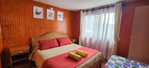 Postel nebo postele na pokoji v ubytování Hostal La nona