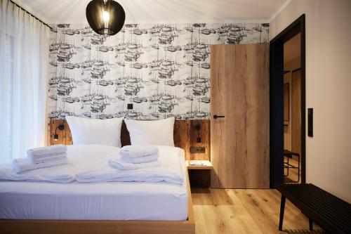 Ένα ή περισσότερα κρεβάτια σε δωμάτιο στο Binnendiek Haus 2 Superior-Apartment 1