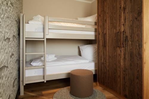 En eller flere senge i et værelse på Binnendiek Haus 2 Apartment 4