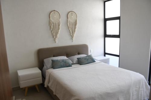 Postel nebo postele na pokoji v ubytování Departamento en Bucerías vista al mar