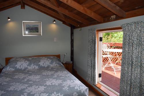 מיטה או מיטות בחדר ב-Dylans Country Cottages