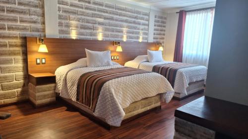 Cama o camas de una habitación en Hotel de Sal Atipax