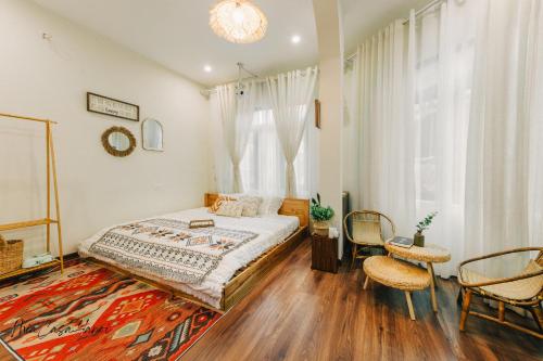 Un pat sau paturi într-o cameră la MiaCasaHanoi