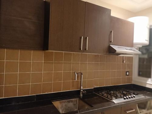 Kuchyň nebo kuchyňský kout v ubytování Appartement Bayt Atik