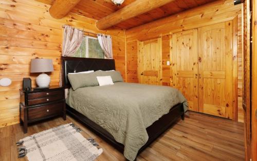 Ліжко або ліжка в номері Timber Toy