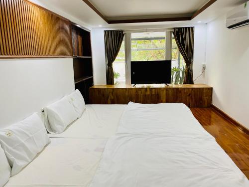 Postel nebo postele na pokoji v ubytování Cleopatra villa